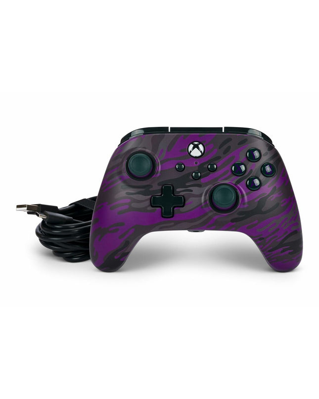 Powera gaming remote control for plug & play gaming consoles, featuring ergonomic design and easy connectivity.