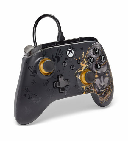 Powera gaming remote control for plug-and-play gaming consoles, black, with buttons and ergonomic design for easy gameplay.