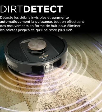 Shark robot stofzuiger schoonmaakt harde vloer met stofreservoir, compact design, geschikt voor huis en koken.