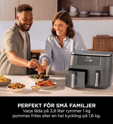 Ninja DZ300EU gray air fryer with 7.6-liter capacity and 2400W power, shown on a kitchen countertop.