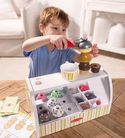 Melissa & Doug action figure toy, colorful plastic doll with accessories, part of the Melissa & Doug playset for kids.