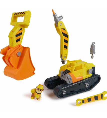 Spin Master Rubble action figure from Paw Patrol toy set, detailed plastic figure with rescue gear and construction uniform.