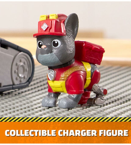 Spin Master Rubble action figure from Paw Patrol toy collection, detailed plastic figure with rescue gear and bright colors.