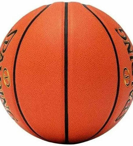 Spalding TF-1000 Legacy multicolour basketball for youth, outdoor sports, with textured grip surface and official size.