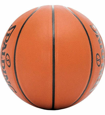 Multicolour Spalding React TF-250 basketball for sport and outdoor play, featuring a textured surface and brand logo.