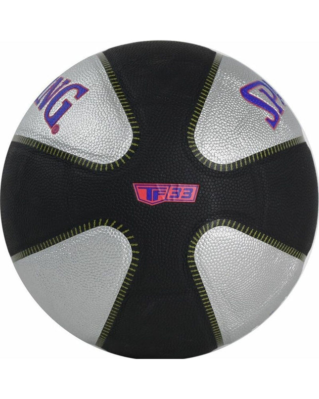 Spalding TF-33 basketball in red and black with size 7 for sports and outdoor play, featuring textured surface and brand logo.