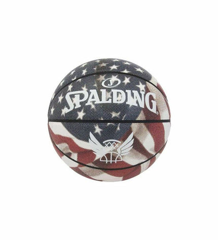 Spalding Trend Stars Stripes multicolour basketball for outdoor sports, featuring vibrant star and stripe design.