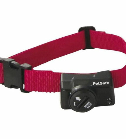 PetSafe anti-diefstal zoekapparaat in rood voor honden, close-up image showing device with branding and textured surface.