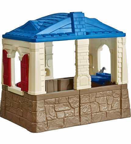 Step 2 Neat & Tidy Cottage toy house for children, colorful playhouse with windows and door, perfect for outdoor play.
