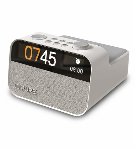 Pure MOMENT radio alarm clock with digital display and sleek black design, featuring buttons on top for easy control.