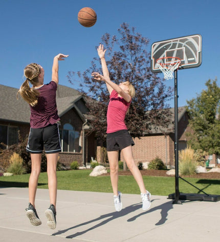 Lifetime basketball hoop for outdoor use with a 305 cm height, featuring a sturdy backboard and net for playing basketball.