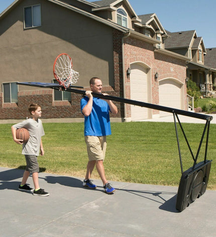 Lifetime basketball hoop for outdoor use, featuring a 305 cm adjustable pole and sturdy backboard for sports and recreation.