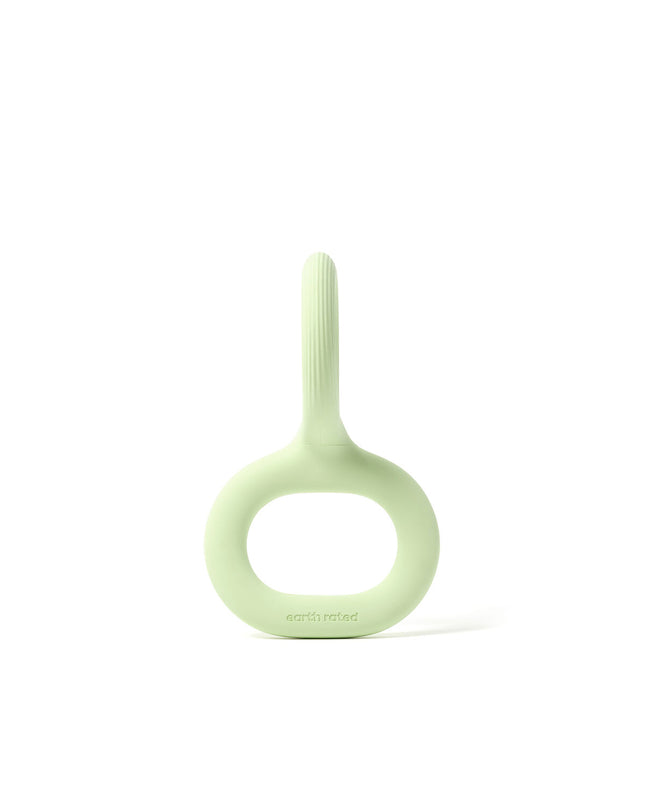 Earth Rated dog toy made of durable rubber, designed for playful dogs, with colorful and textured surface for chewing and fun.