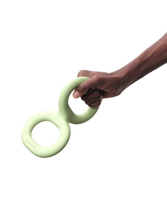 Earth Rated dog toy made of durable rubber, designed for playful dogs, with bright colors and textured surface.