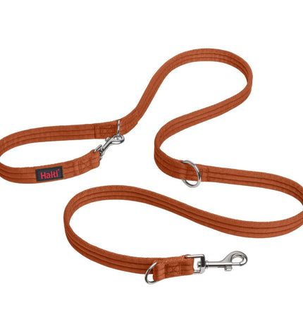 Orange dog toy from Company of Animals Volglijn collection, made of durable rubber with textured surface for dogs.