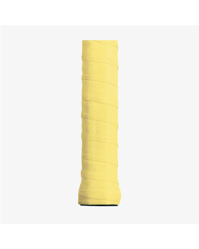 Yellow Wilson tennis overgrip for paddle tennis, showing a close-up of the textured grip surface with branding details.