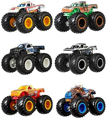 Two Hot Wheels Monster Truck demolition doubles toy vehicles with bold colors and detailed monster truck designs.