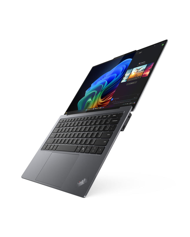 Lenovo 14-inch laptop with Intel Core Ultra 7, 32GB RAM, 1TB SSD, QWERTY Spanish keyboard, sleek design, open screen showing keyboard