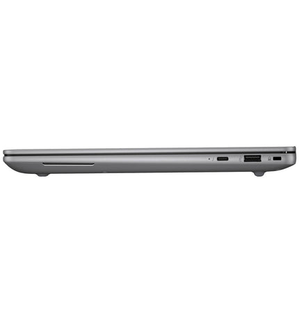 HP 14-inch laptop with 32GB RAM and 1TB SSD, showing the sleek design and keyboard in a professional workspace.