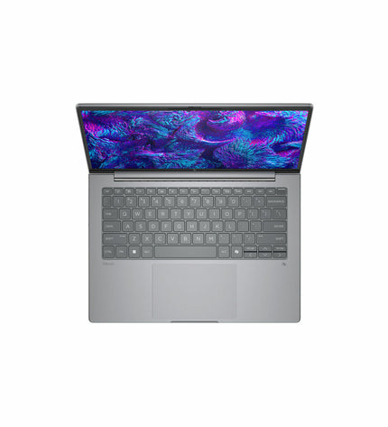 HP Laptop A3ZR7ET#ABE with sleek design and keyboard, shown on a clean desk setup.