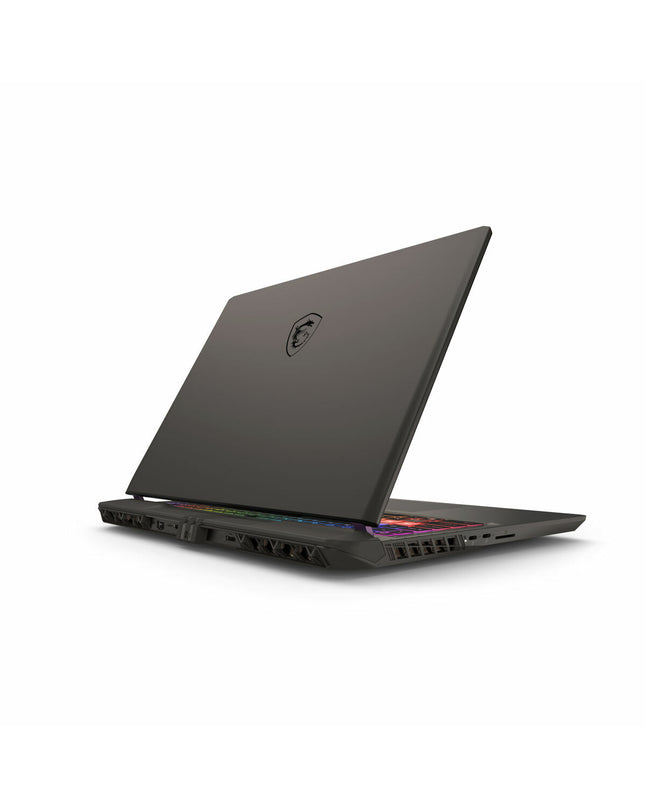 MSI 16-inch gaming laptop with 32GB RAM, 1TB SSD, and RTX 5080 graphics card displayed on a sleek desk setup.