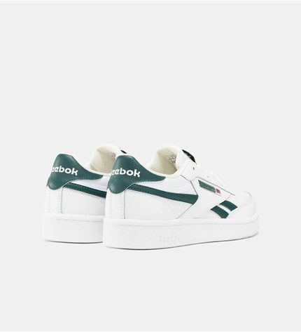 Reebok Club C Revenge white tennis shoes for kids with clean design and cushioned soles, suitable for sport and outdoor tennis activities.