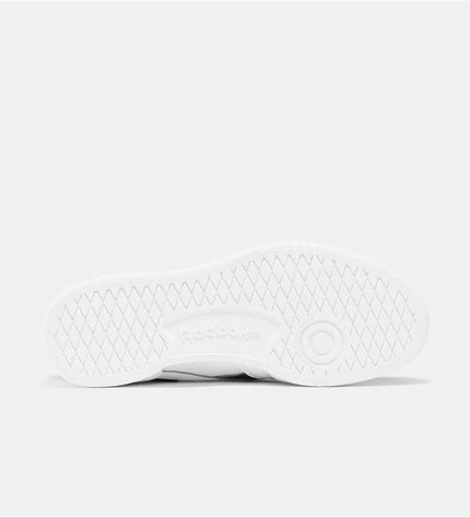 Reebok Club C Revenge white tennis shoes for kids, sport and outdoor footwear with clean, classic design and supportive sole.