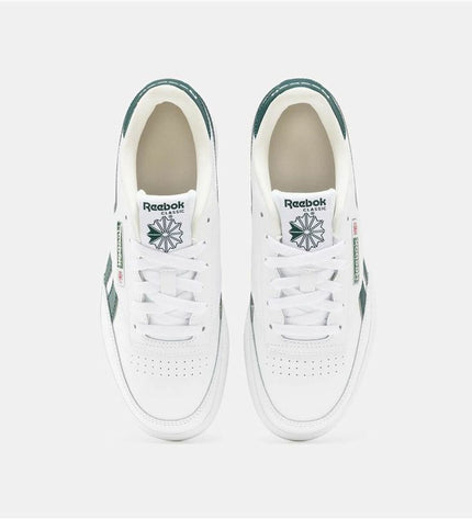 Reebok Club C Revenge white tennis shoes for kids, sport and outdoor footwear with classic design and cushioned soles.