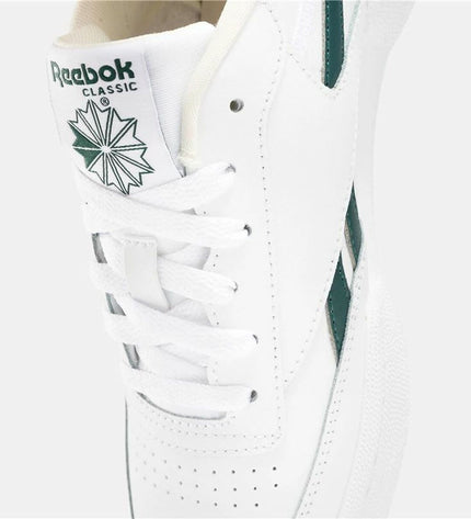 Reebok Club C Revenge white tennis shoes for sport and outdoor tennis, featuring a classic design and supportive sole.