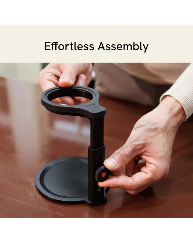 Black Outin NANO universal holder for household, kitchen, coffee, and tea storage, shown in a close-up image.