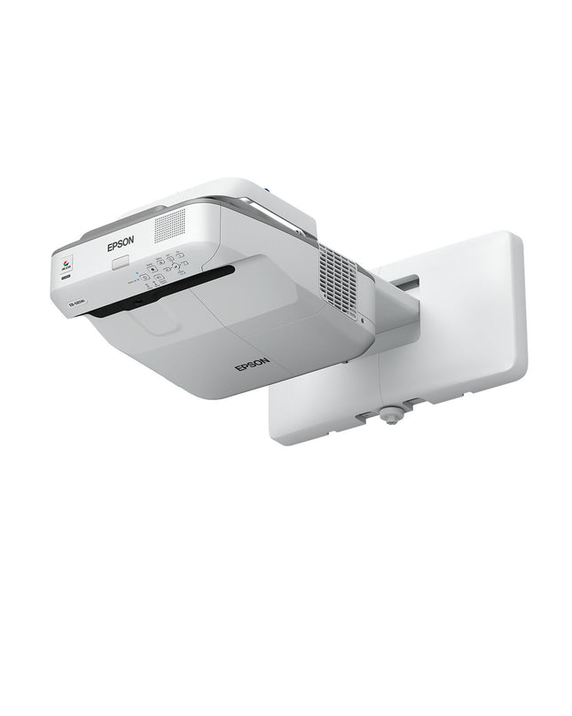 Epson V11H744040 projector displaying colorful home theater image on a wall in a modern living room setting