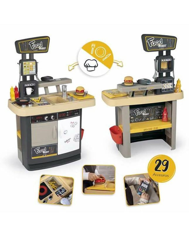 Smoby speelgoedkeuken with realistic stove, sink, and accessories, designed for imaginative play in children.