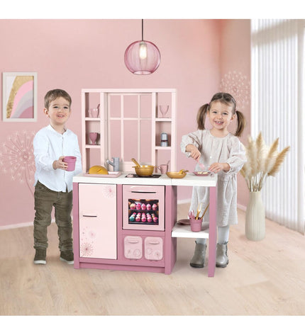 Smoby toy kitchen set with realistic stove, sink, and utensils, designed for imaginative play and role-playing activities.