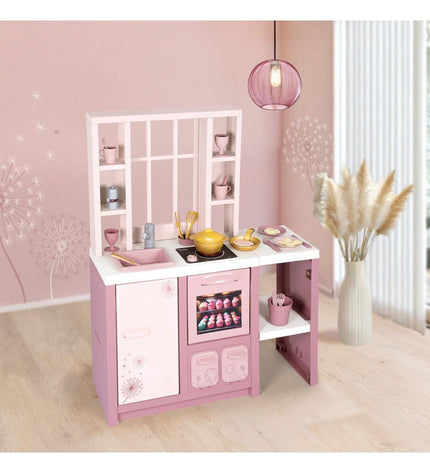 Smoby speelgoedkeuken met speelgoedgerei en accessoires, ideaal voor imiteerspelletjes en creatieve speelactiviteiten.