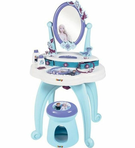 Smoby toilet with attached bench in a children's playhouse, featuring realistic design and bright colors.