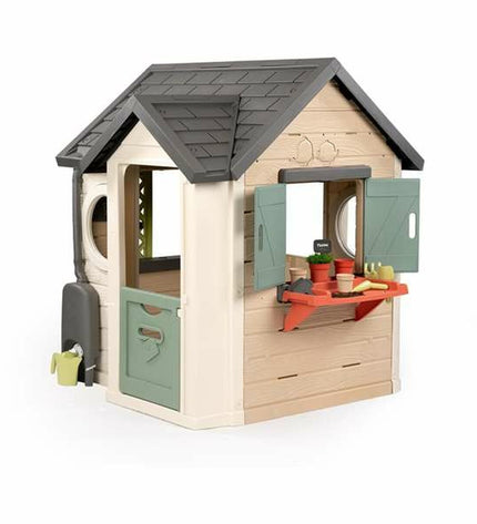 Smoby Life Garden children's playhouse with colorful windows and door, designed for outdoor fun and imaginative play.