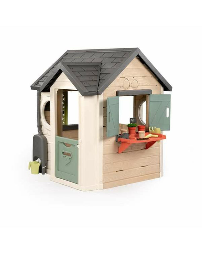 Smoby Life Garden children's playhouse with colorful windows and door, designed for outdoor fun and imaginative play.