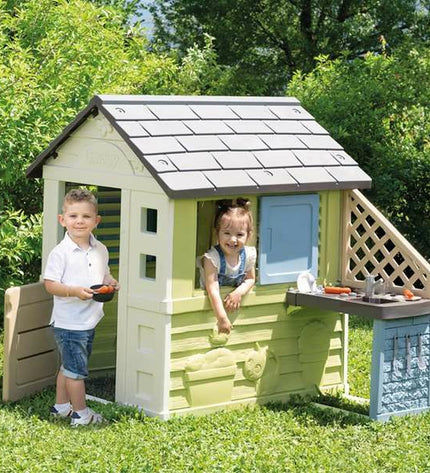 Smoby children's toy playhouse for outdoor play, featuring colorful design and windows, perfect for kids' outdoor activities.