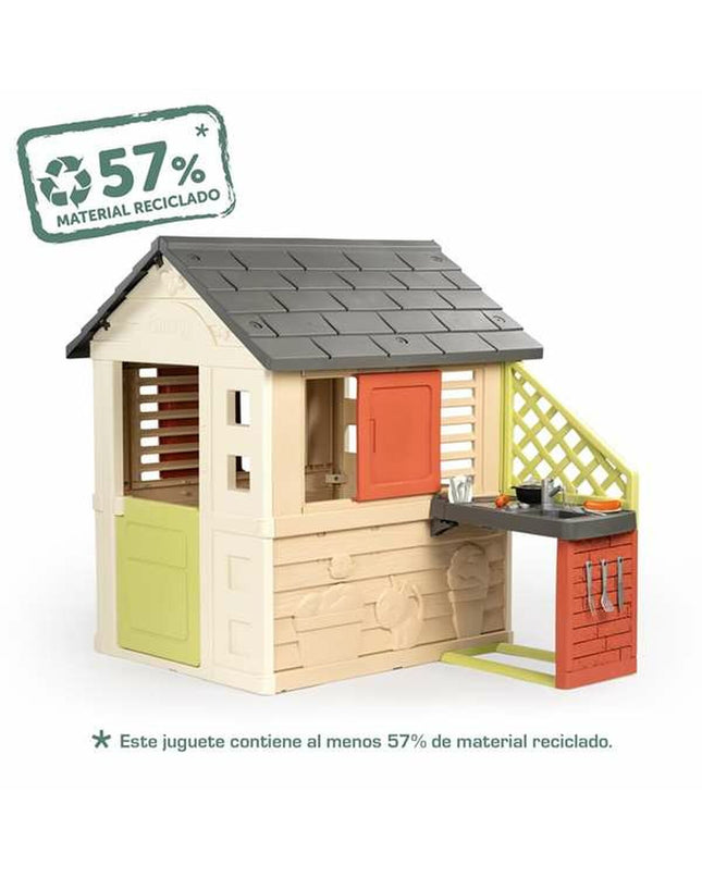 Smoby Nature children's playhouse with open door and windows, ideal for outdoor play and imaginative adventures.
