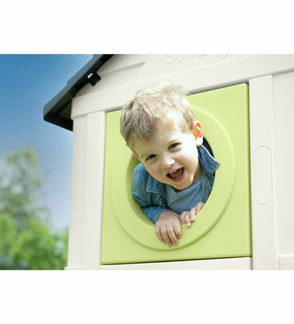 Smoby children's toy house for outdoor play, featuring bright colors and a detailed miniature design for kids' outdoor fun.