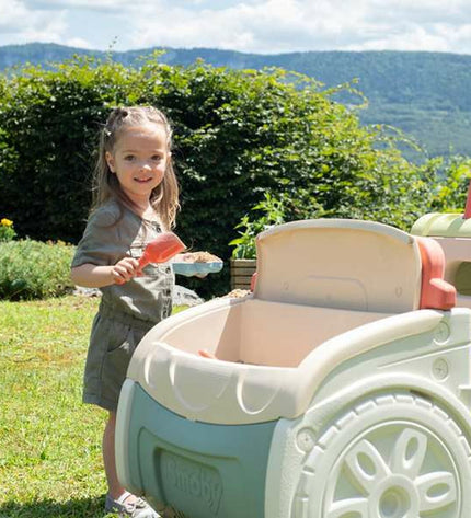 Smoby outdoor playset with slides and climbing features, designed for children’s outdoor fun and active play.