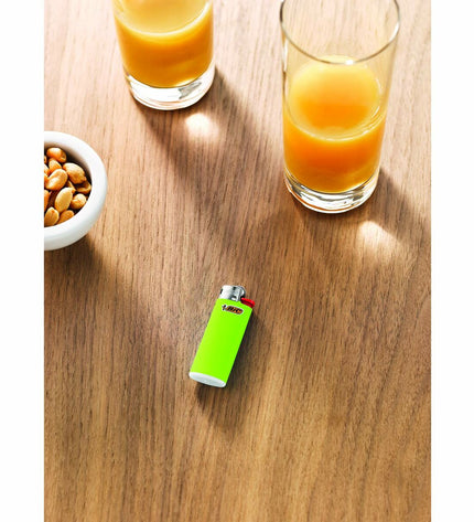 Bic mini J25 multicolour lighters, pack of 50, ideal for household cooking and cleaning tasks, in colorful design.