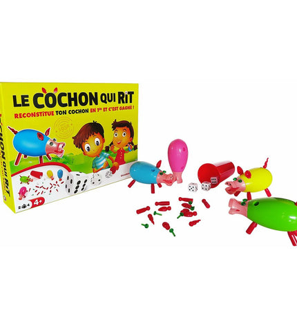 Dujardin Laughing Pig board game with colorful pig figurine and game components on a table, playful and engaging toy for kids.