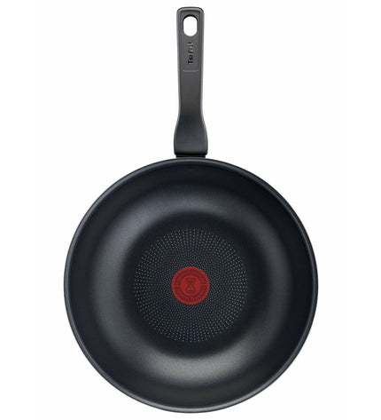 Tefal C38519 black 28cm aluminum frying pan for home cooking, with a non-stick surface and ergonomic handle.