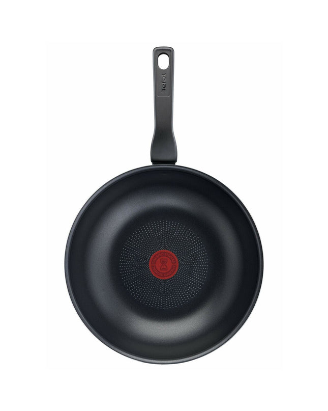 Tefal C38519 black 28cm aluminum frying pan for home cooking, with a non-stick surface and ergonomic handle.