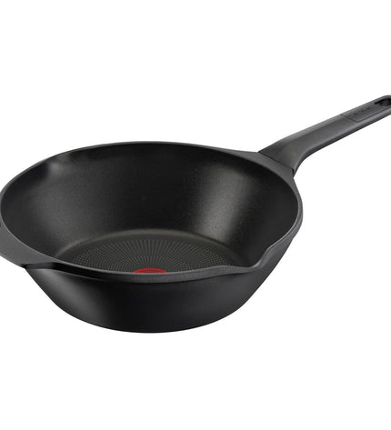 Tefal E2491944 kitchen pan for cooking, black non-stick cookware with ergonomic handle, suitable for various stove types.
