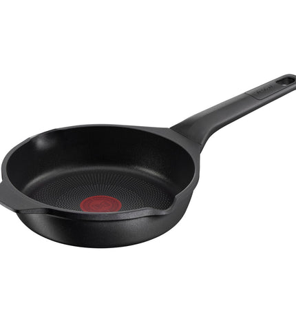 Tefal E2490244 non-stick frying pan in black, suitable for home cooking, with a comfortable handle and durable surface.