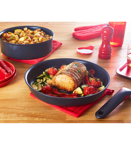 Tefal L76305 black aluminum frying pan with 26cm diameter, suitable for cooking and kitchen use.