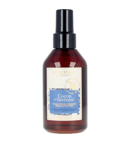 L'Occitane En Provence Cocondé Sérénité 100ml cushion mist with floral and calming design in a clear glass spray bottle.