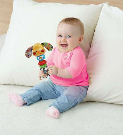 Vtech Puppy Toby Rammelaar for babies, colorful soft plush toy with a friendly puppy face, designed for young children to play with.